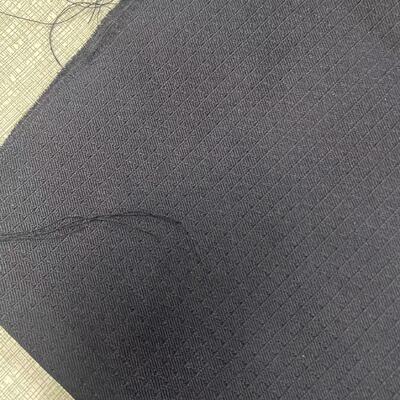NE32S2 Aramid Elyaf Kumaş Beyaz 0.2mm Kalınlık Takviye ve Koruyucu Tekstillere Uygun Yüksek Mukavemetli Kumaş